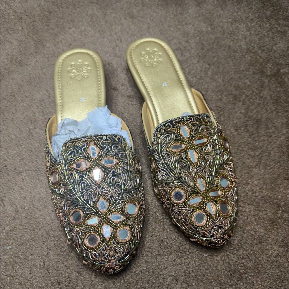 Low heel mules with embroidered mirror design and intricate shimmer detailing